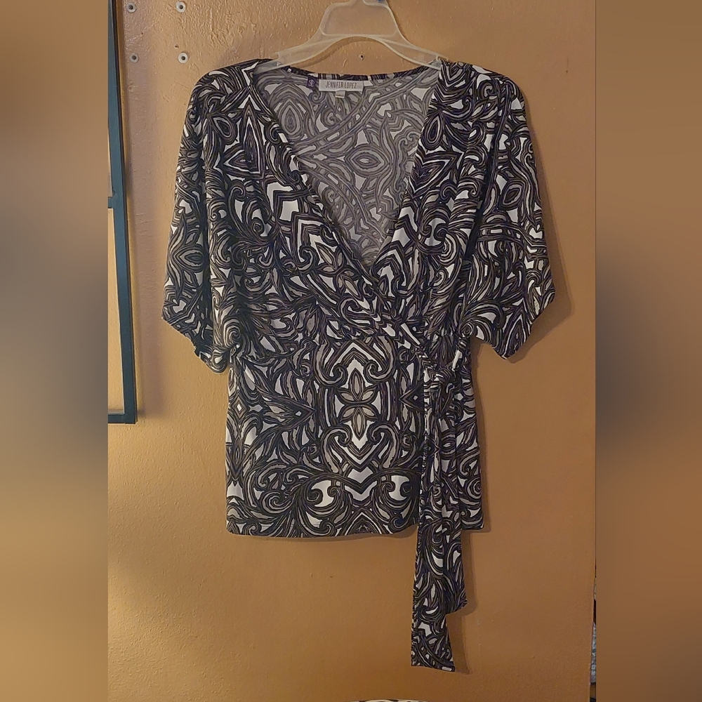 Jennifer Lopez faux wrap blouse with side tie.